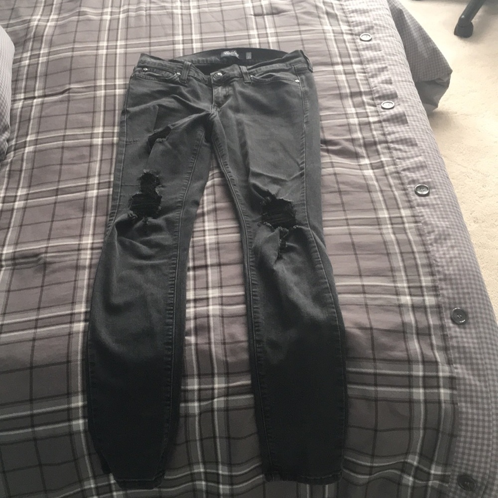 Black distressed denim jeans